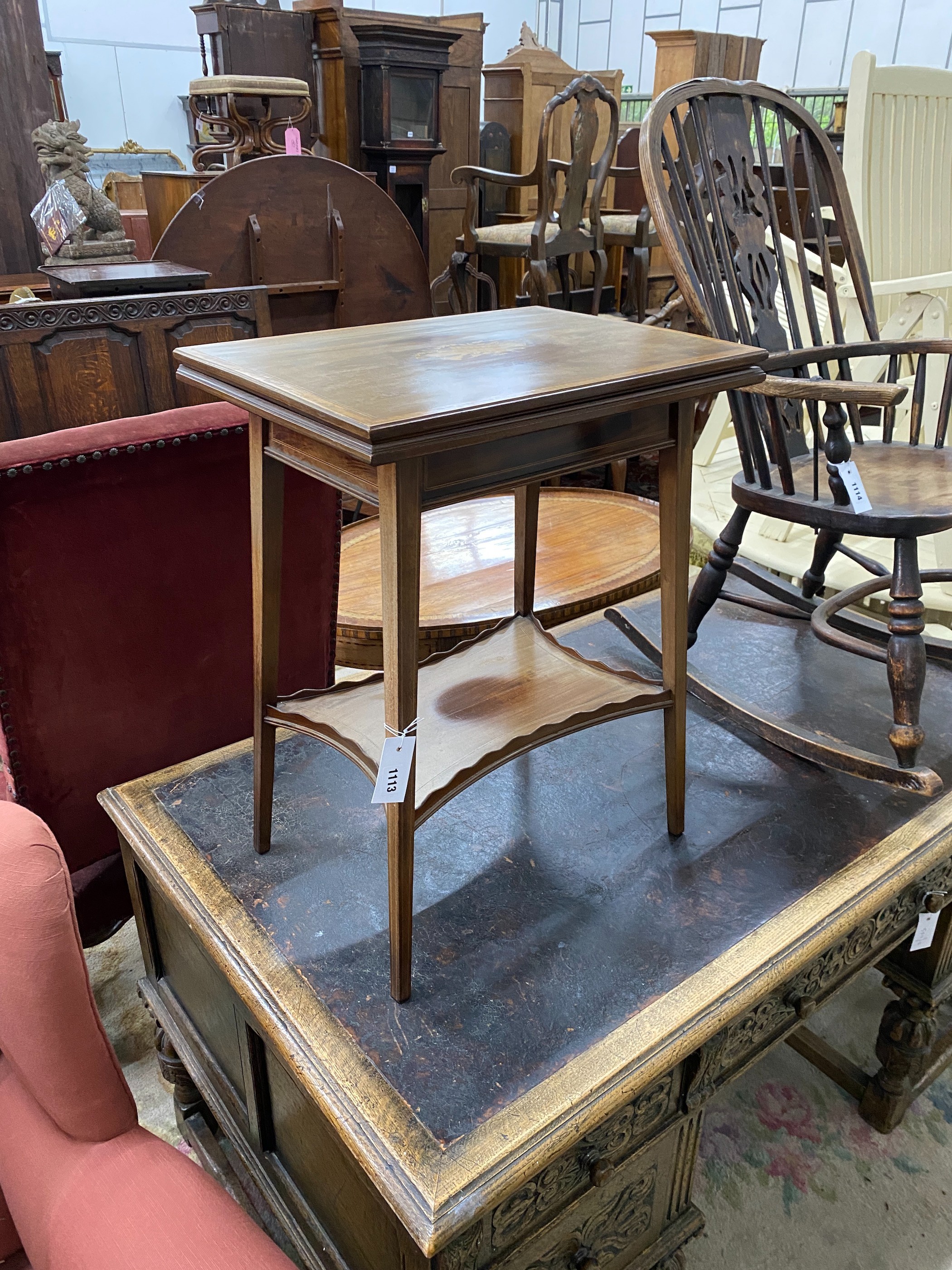 An Edwardian inlaid mahogany rectangular folding tea table, width 51cm, depth 38cm, height 65cm